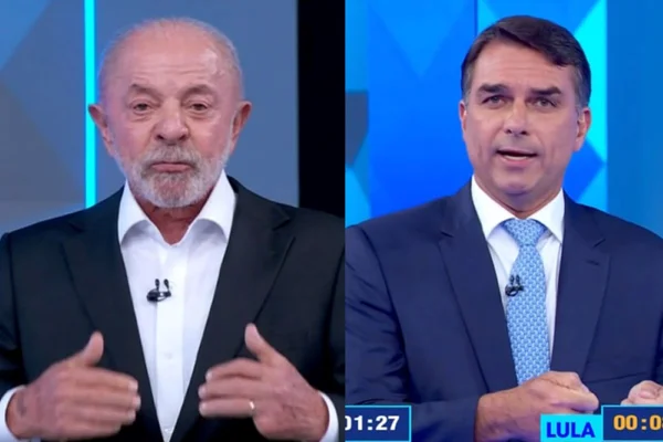 Flávio Bolsonaro e Lula durante debate na TV Globo - Metrópoles