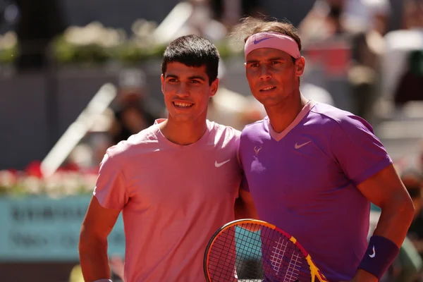Carlos Alcaraz e Rafael Nadal durante o Master de Madrid em 2021