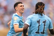 Dupla Foden e Doku, do Manchester City