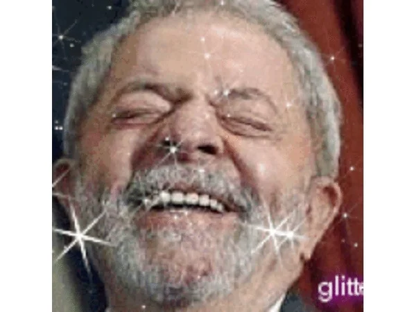 GIF de Lula rindo com filtro de brilho - Metrópoles