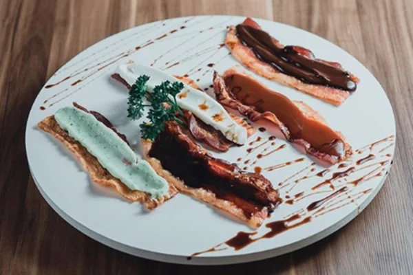 Beer Club cria cardápio exclusivo tendo bacon como carro-chefe
