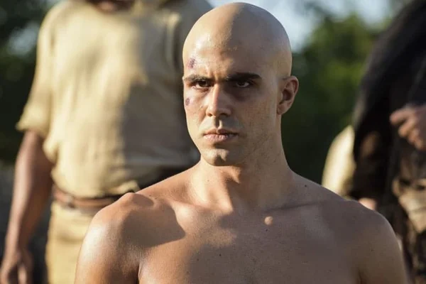 Gênesis - homem careca aparece com fundo de natureza