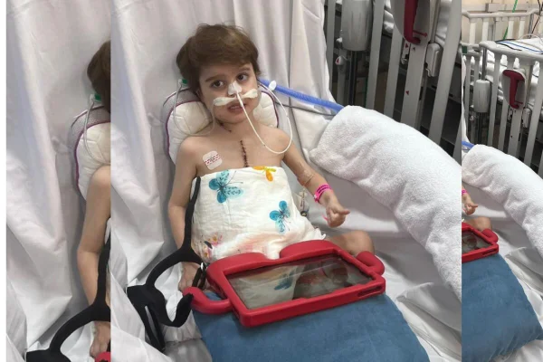 Menino em maca de hospital - Metrópoles