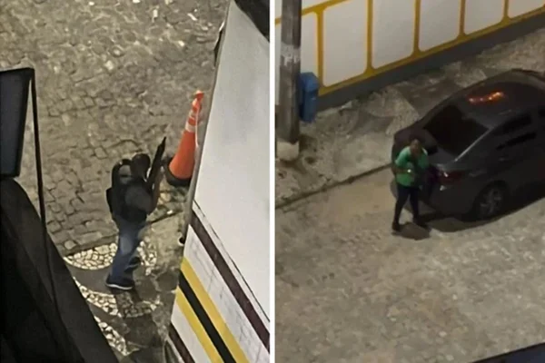 Imagem colorida, Criminosos armados com fuzis são flagrados por moradores após tiroteio - Metrópoles