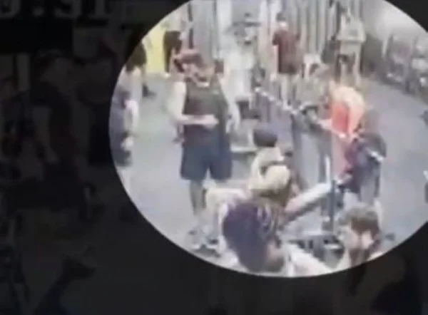 foto colorida de pessoas na academia