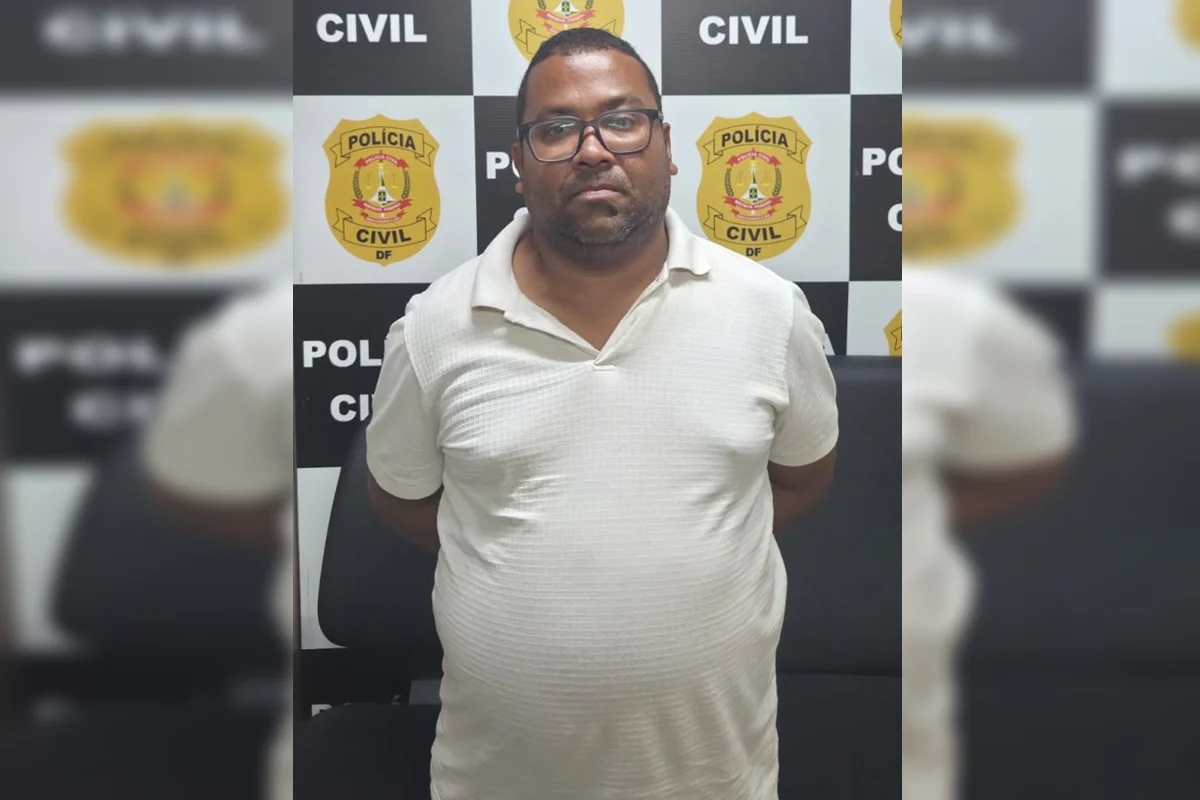 Um dos suspeitos preso que não teve a identidade revelada Um dos suspeitos preso que não teve a identidade revelada