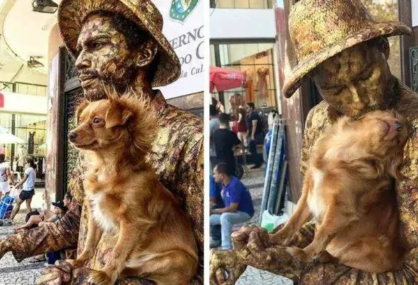 Cadelinha ajuda seu pai humano trabalhando como “estátua viva”