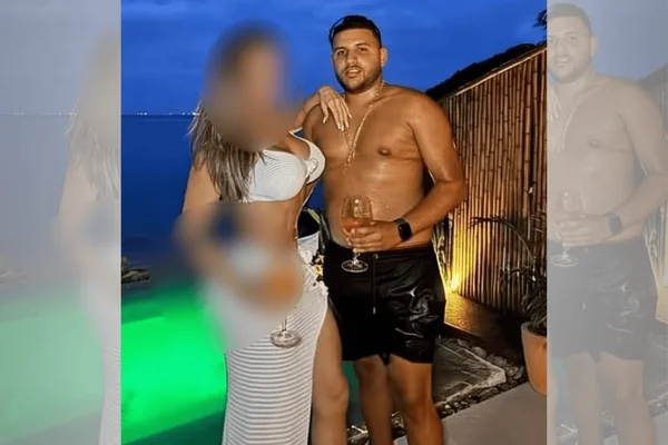Homem e mulher na frente da piscina
