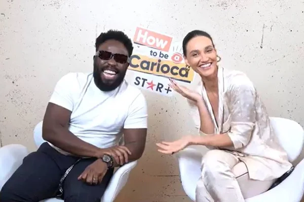 Print colorido de entrevista de vídeo com Douglas Silva e Deborah Nascimento - Metropoles