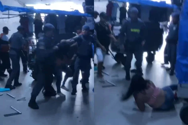 Captura de tela de vídeo que mostra policial militar (PM) agredindo comerciante mulher no Brás. - Metrópoles