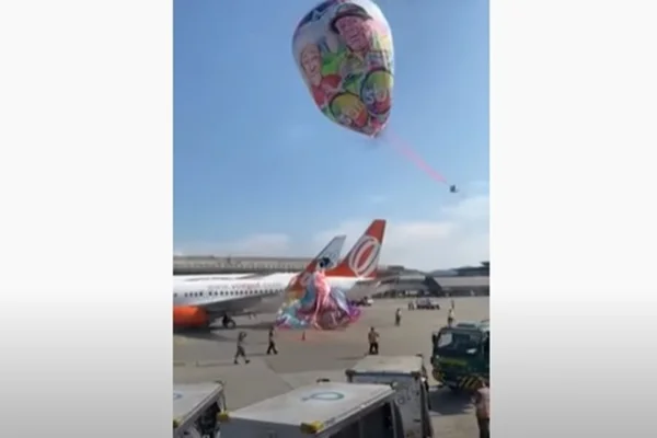 Balão com logo do SBT cai no Aeroporto de Guarulhos