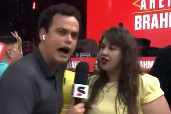 Repórter Pedro Rocha, da Globo, fica boquiaberto ao ouvir de torcedora que prefere uma foto de Gustavo Mioto ao hexa da seleção brasileira - Metrópoles