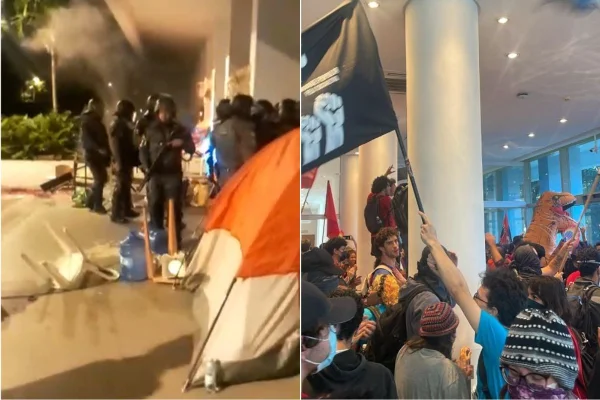Imagem colorida mostra PM em desocupação da reitoria da USP. Metrópoles