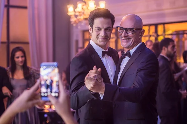 Pedrinho Guimarães (Marcos Caruso)e Eric (Mateus Solano) em Pega Pega