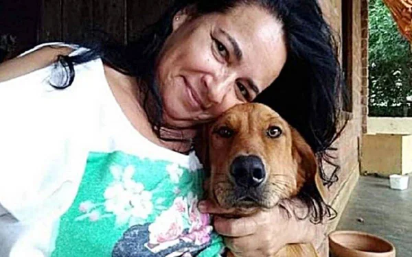 Cachorro e tutora