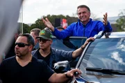 Ex-presidente Jair Bolsonaro em motociata com apoiadores em Brasília. Ex-presidente Jair Bolsonaro em motociata com apoiadores em Brasília.