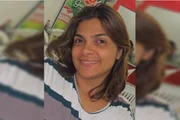 Ela estava acompanhada de uma amiga no aeroporto  Ela estava acompanhada de uma amiga no aeroporto