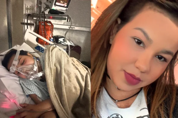 Mulher branca com respirador em maca de hospital - Metrópoles