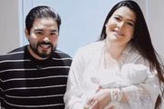 Yudi com a esposa e o filho
