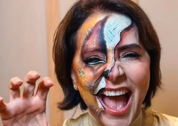 Foto colorida de candidata eleita de Aracaju com maquiagem de leoa - Metrópoles