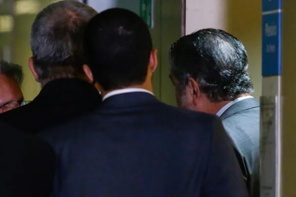 Munido de um HC, Palocci não fala, mas promete voltar à CPI do BNDES