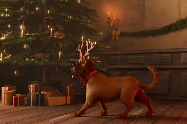 desenho de cachorro com orelhas de rena andando perto de árvore de natal - metrópoles