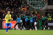 Jogadores da Bolívia comemorando Jogadores da Bolívia comemorando
