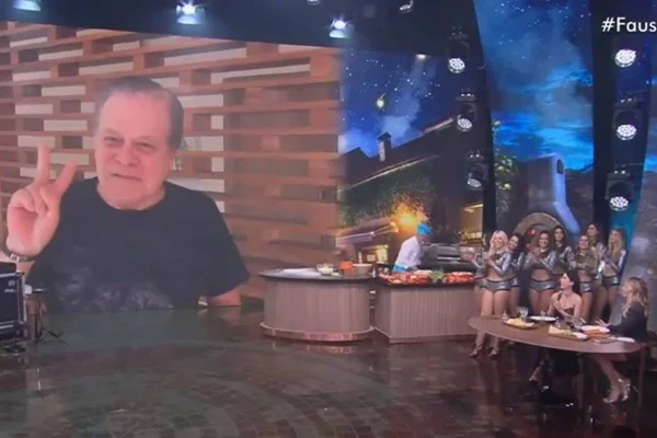 Foto colorida de Chico Pinheiro no Faustão na Band - Metrópoles