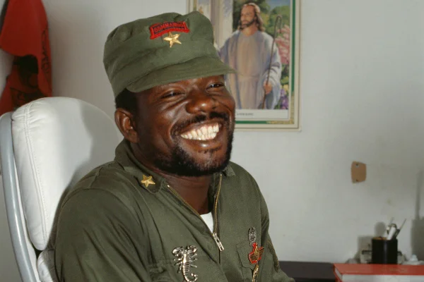Prince Yormie Johnson, leader of the militant group Independent National Patriotic Front of Liberia (INPFL), sits in an office in Monrovia. Responding to years of government corruption and oppression, in 1989 the National Patriotic Front of Liberia (NPFL) launched a revolt against President Samuel Doe, seizing control of much of Liberia and plunging the country into massive civil war. During the war Prince Johnson split from the NPFL and formed the INPFL; then he and his forces captured, tortured, and executed President Doe. (Photo by Patrick ROBERT/Sygma via Getty Images)