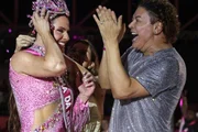 Karen Lopes e David Brazil são clicados durante evento