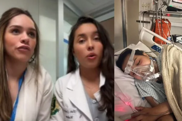 Imagem colorida de duas jovens com jalecos de médico em ambiente hospitalar - Metrópoles