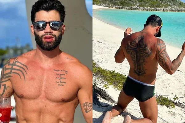 A imagem colorida mostra o cantor Gusttavo Lima de sunga na praia