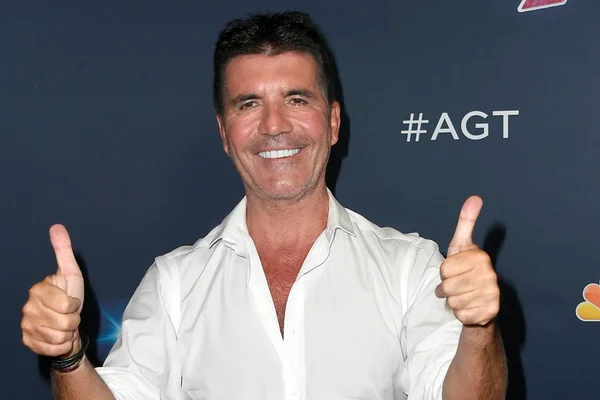 Simon Cowell quer montar uma banda para superar o K-pop