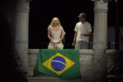 Lady Gaga held out the Brazilian flag during a speech at her concert in Copacabana