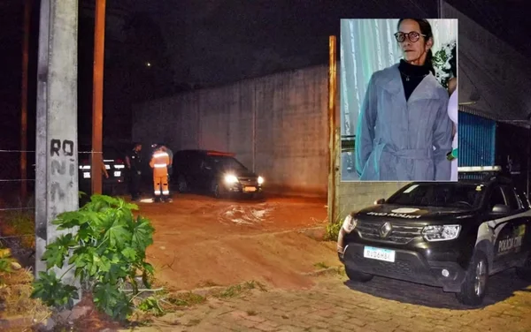 Imagem de agentes retirando o corpo da vítima, em um terreno baldio no MG - Metrópoles