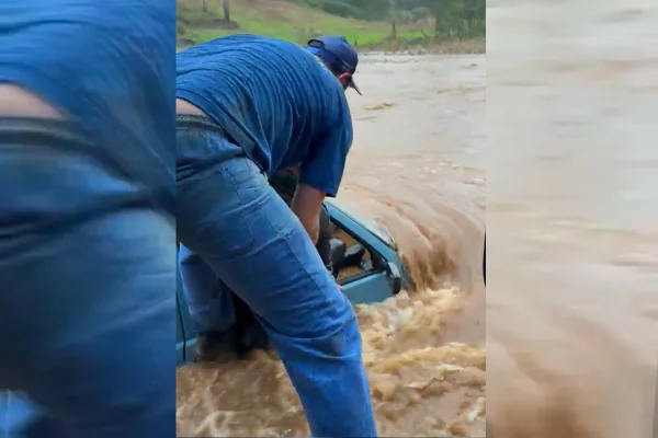 Imagem colorida,Homem de 82 anos é resgatado após carro ficar submerso em alagamento- Metrópoles
