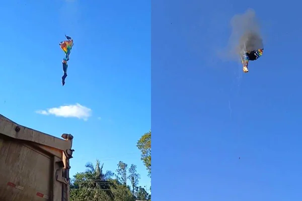 Imagem colorida de balão de ar quente em queda livre após pegar fogo em SC