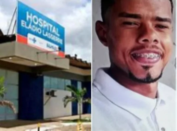 foto colorida de hospital ao lado de homem com blusa branca