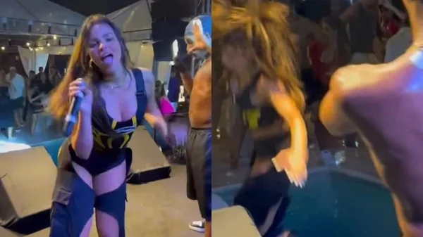 Gabily caindo em piscina durante show
