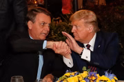 Bolsonaro e Trump em jantar nos Estados Unidos em março de 2020