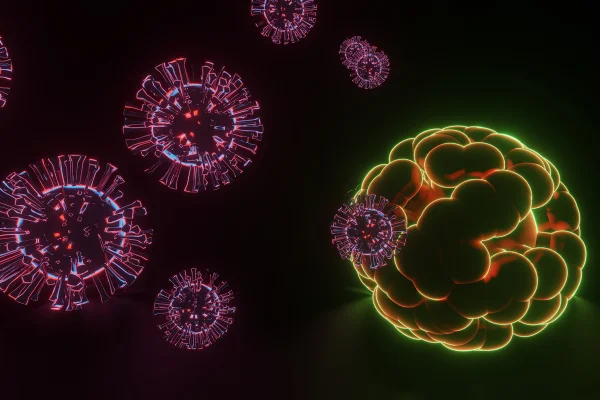Ilustração colorida de célular ao lado de tumor iluminado por luz verde - Metrópoles.