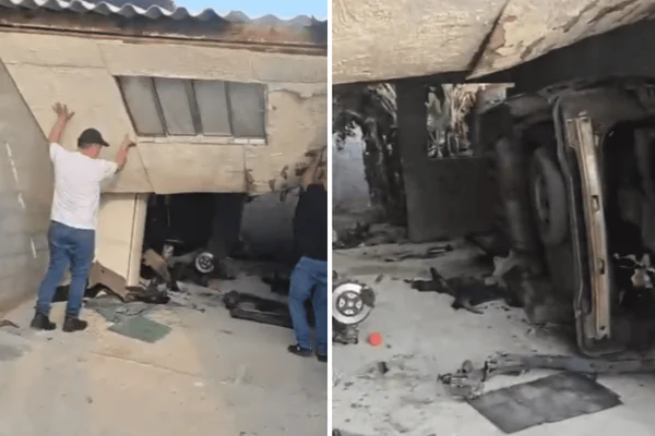 Imagem colorida de um carro desmanchado dentro de uma garagem - Metrópoles