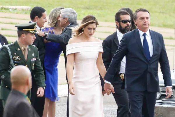 Mauro Cid, Bolsonaro e Michelle durante posse presidencial 2019