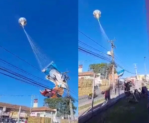 Imagem colorida de balão caindo na fiação elétrica em Curitiba (PR) - Metrópoles