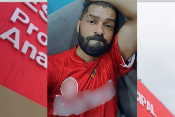 Homem pardo com barba preta, cabelo curto e camiseta vermelha - Metrópoles