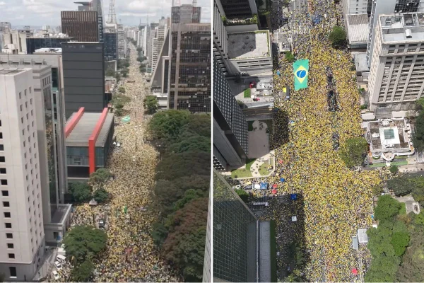 Imagem colorida mostra manifestação com Flávio Bolsonaro na Avenida Paulista. Metrópoles