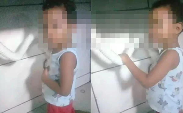 Garoto assustado após ficar com o braço preso no cano em Goiás