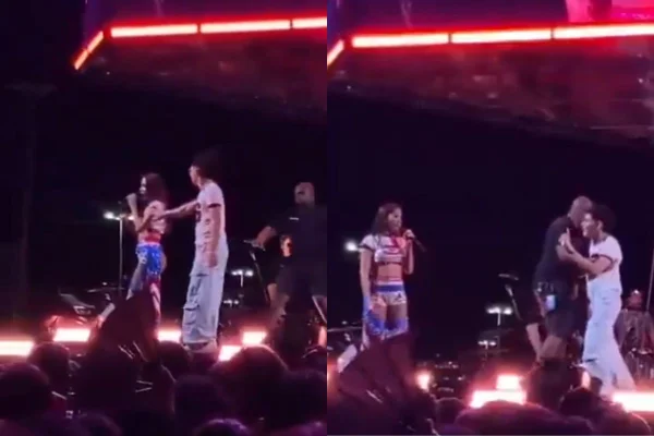 Foto colorida de Anitta no palco - Metrópoles
