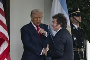 WASHINGTON DC, UNITED STATES - OCTOBER 14: United States President Donald Trump greets the President of Argentina Javier Milei at the White House in Washington DC , October 14, 2025. (Photo by Celal Gunes/Anadolu via Getty Images) WASHINGTON DC, UNITED STATES - OCTOBER 14: United States President Donald Trump greets the President of Argentina Javier Milei at the White House in Washington DC , October 14, 2025. (Photo by Celal Gunes/Anadolu via Getty Images)