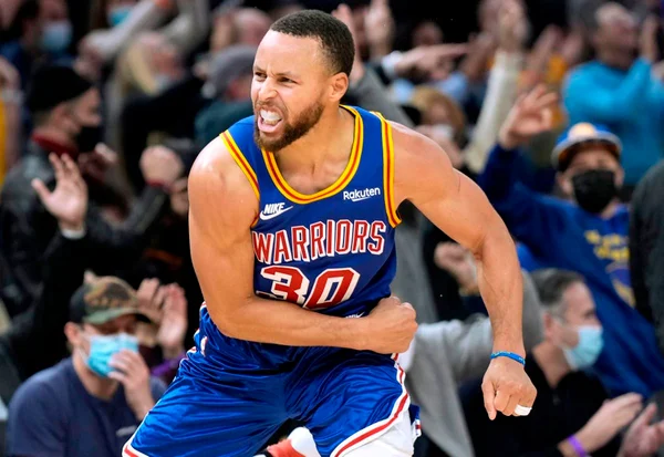 Stephen Curry comemorando